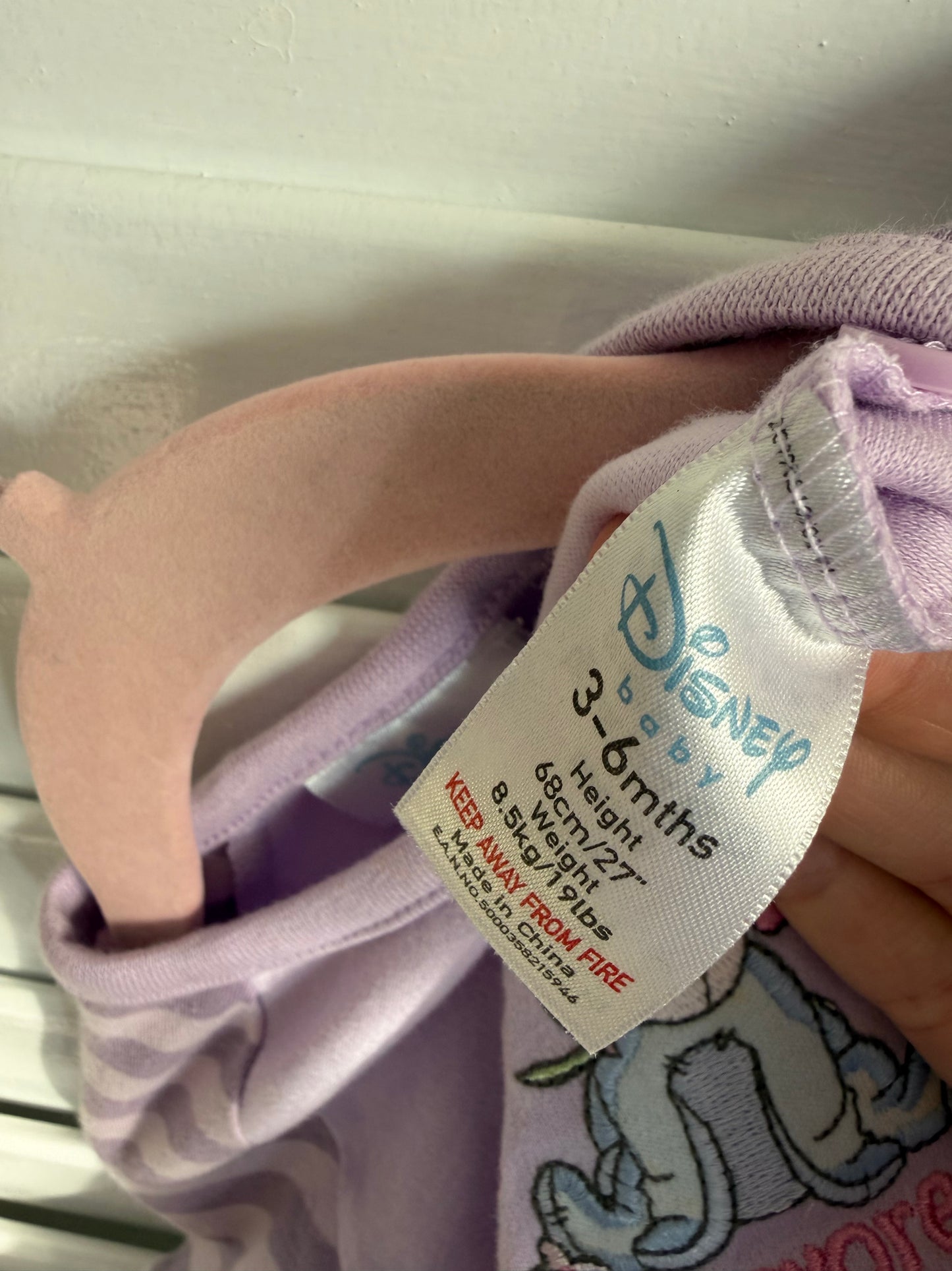 eeyore “sunny days” romper NWOT 3-6m